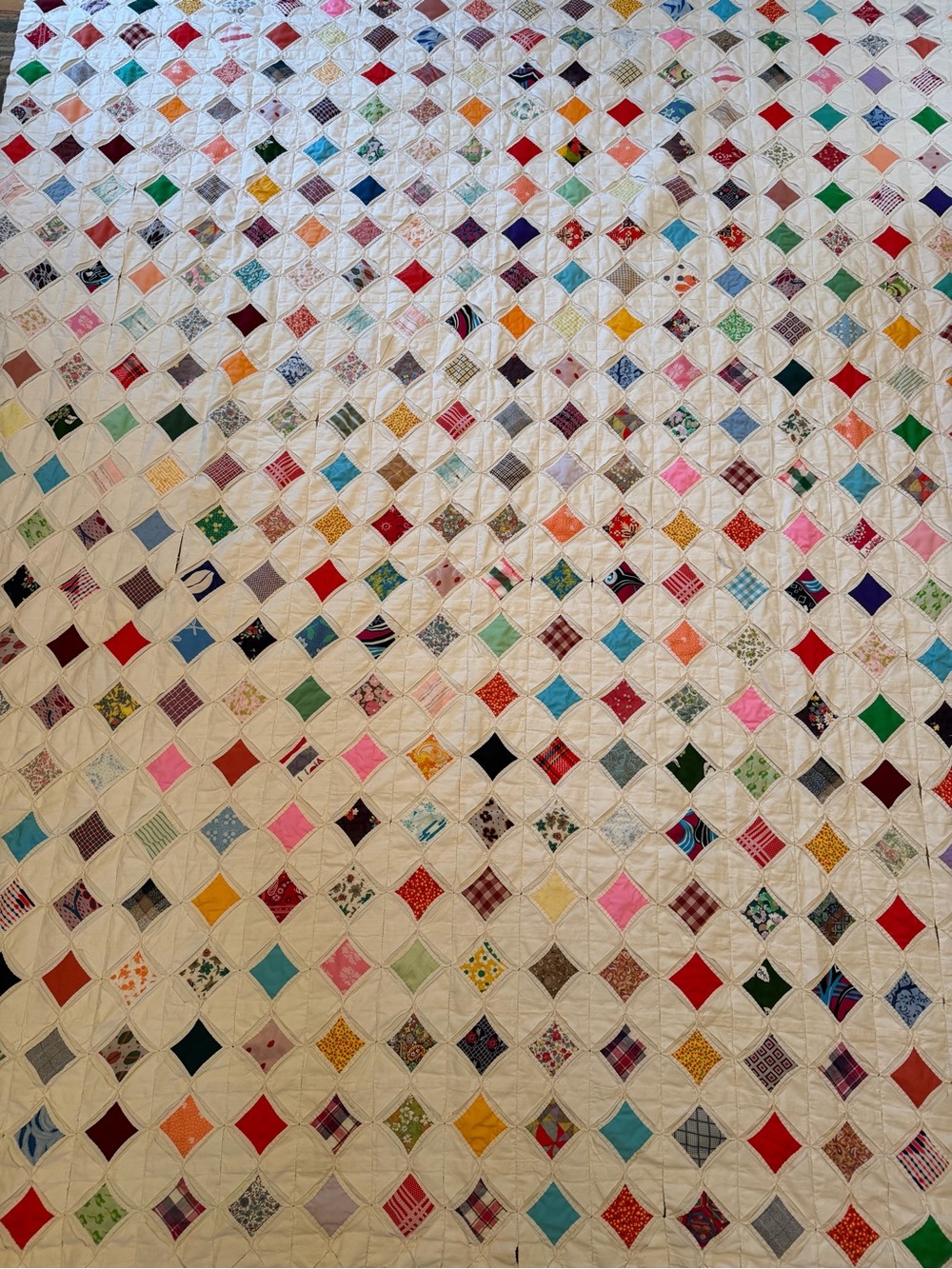 Handmade White Patchwork Cotton Quilt with Multicolor Accents 91 x 76 inches